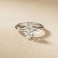 Lab Grown Diamond ring on a beige background White