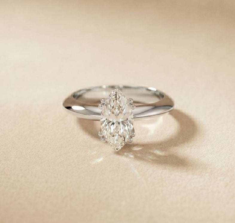 Lab Grown Diamond ring on a beige background White