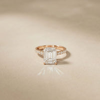 3.70 CTW Emerald Cut Lab Grown Diamond Luxe Pave Engagement Ring Rose Gold