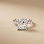 Diamond ring with a beige background White