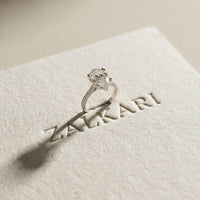 4.60CTW Pear Cut Lab Grown Diamond Serelisse Pavé Engagement Ring White