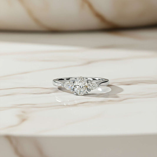 Silver Oval and Pear Moissanite Trilogy Ring