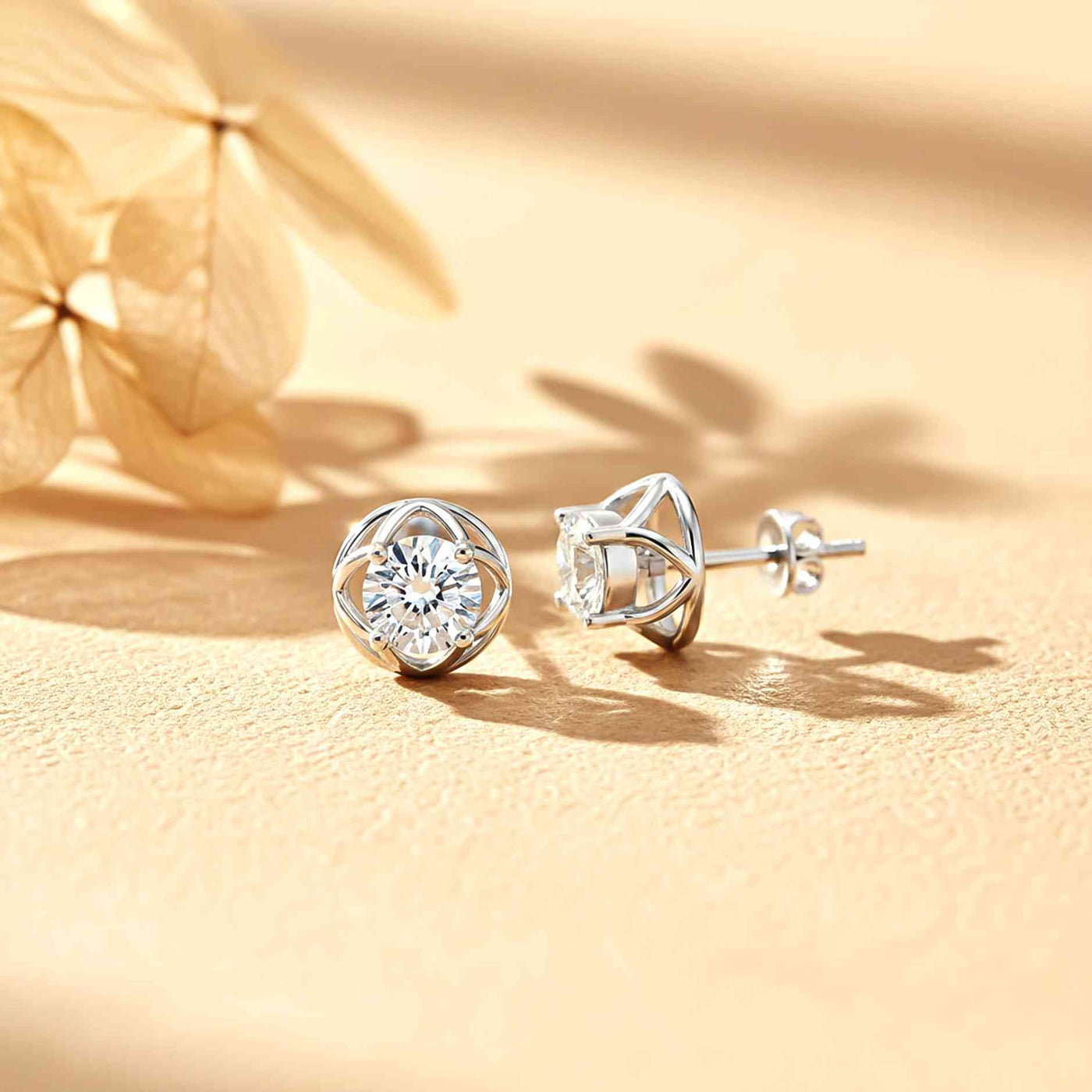 5mm round brilliant moissanite stud earring in four-prong sterling silver setting