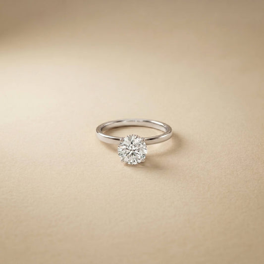 Diamond ring on a beige background