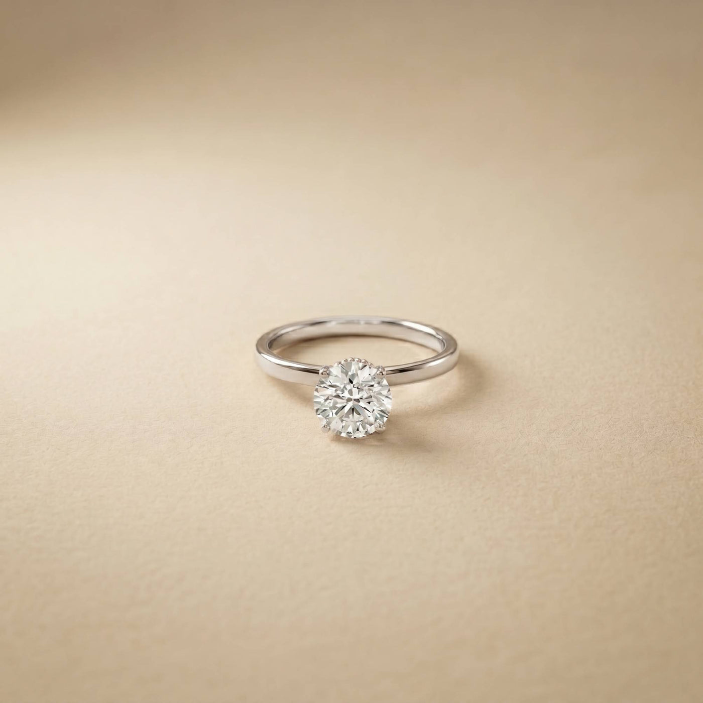Diamond ring on a beige background White