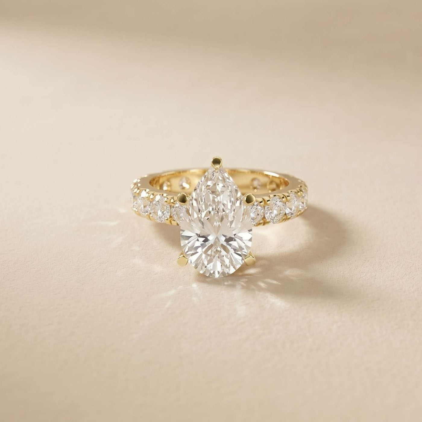4.76 Ct Pear Moissanite Pavé Engagement Ring