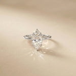 Diamond ring on a beige background