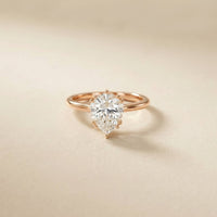 2.04 Ct Pear Moissanite Side-Profile Sparkle Engagement Ring