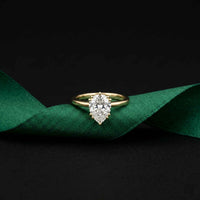 2.04 Ct Pear Moissanite Side-Profile Sparkle Engagement Ring