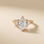 2.80 Ct Pear Moissanite Three Stone Engagement Ring Rose Gold