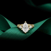 2.80 Ct Pear Moissanite Three Stone Engagement Ring Gold