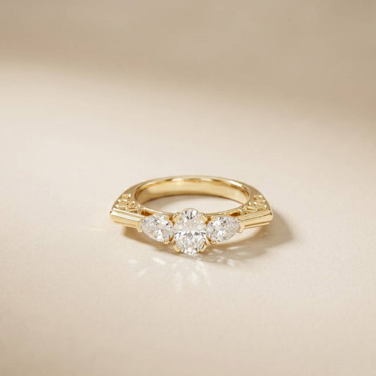 0.75 Ct Pear Moissanite Trilogy Elegance Ring