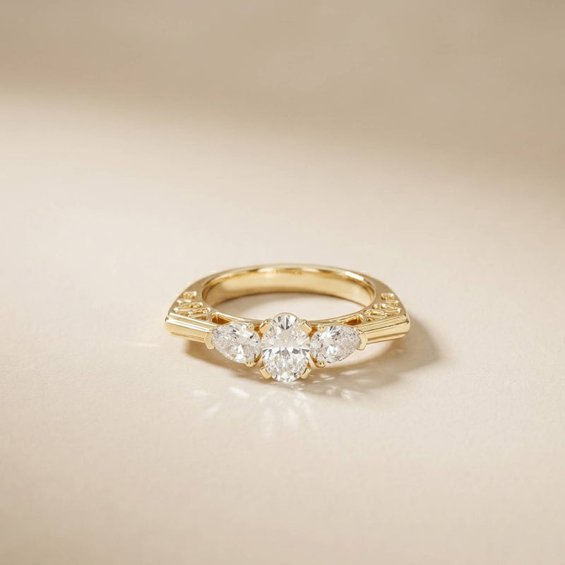 0.75 Ct Pear Moissanite Trilogy Elegance Ring