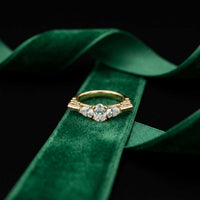 0.75 Ct Pear Moissanite Trilogy Elegance Ring