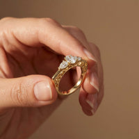 0.75 Ct Pear Moissanite Trilogy Elegance Ring