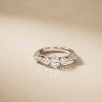 0.75 Ct Pear Moissanite Trilogy Elegance Ring