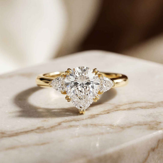 2.40 Ct Pear Cut Moissanite Three Stone Ring