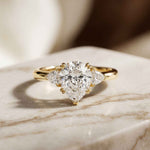 2.40 Ct Pear Cut Moissanite Three Stone Ring Gold