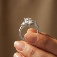 2.40 Ct Pear Cut Moissanite Three Stone Ring White