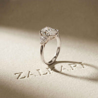 2.3 Ct Pear Cut Moissanite Solitaire Three Stone Ring