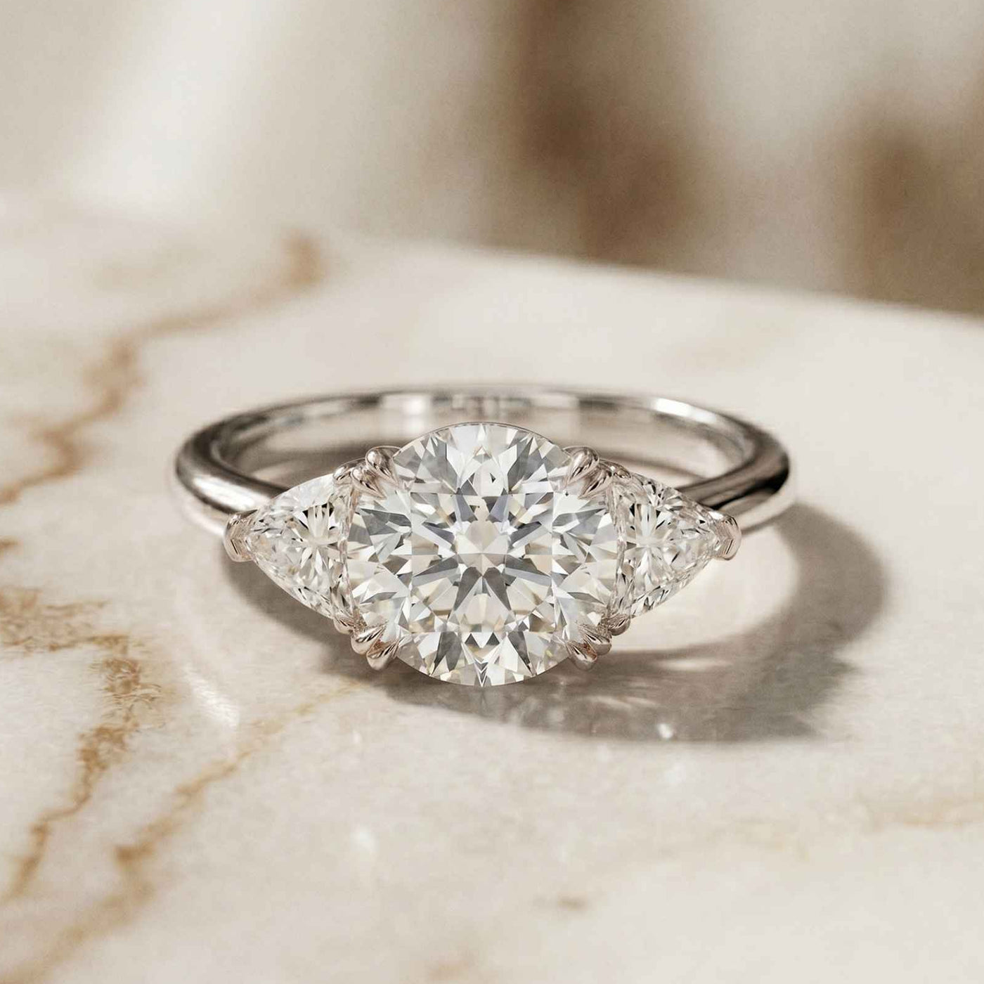 2.3 Ct Round & Trillion Moissanite Three Stone Elegance Ring