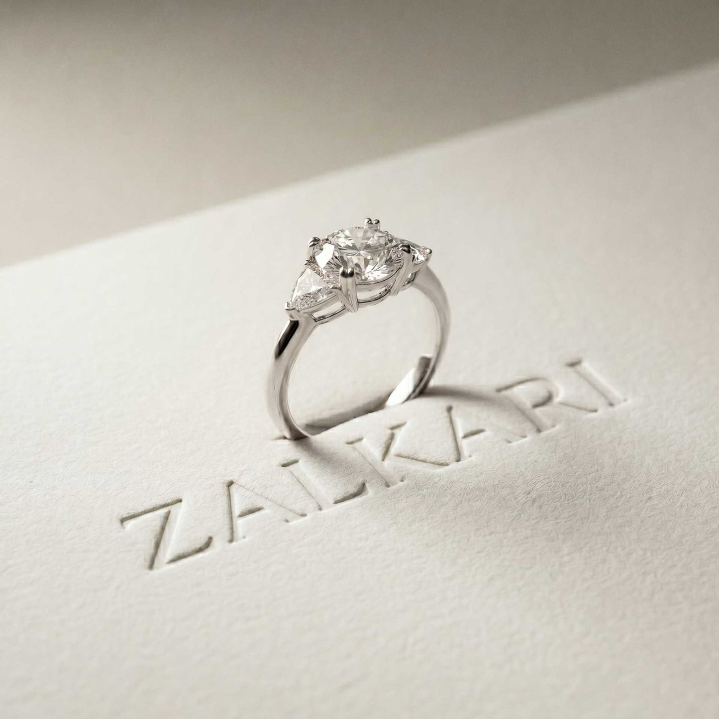 2.3 Ct Round & Trillion Moissanite Three Stone Elegance Ring