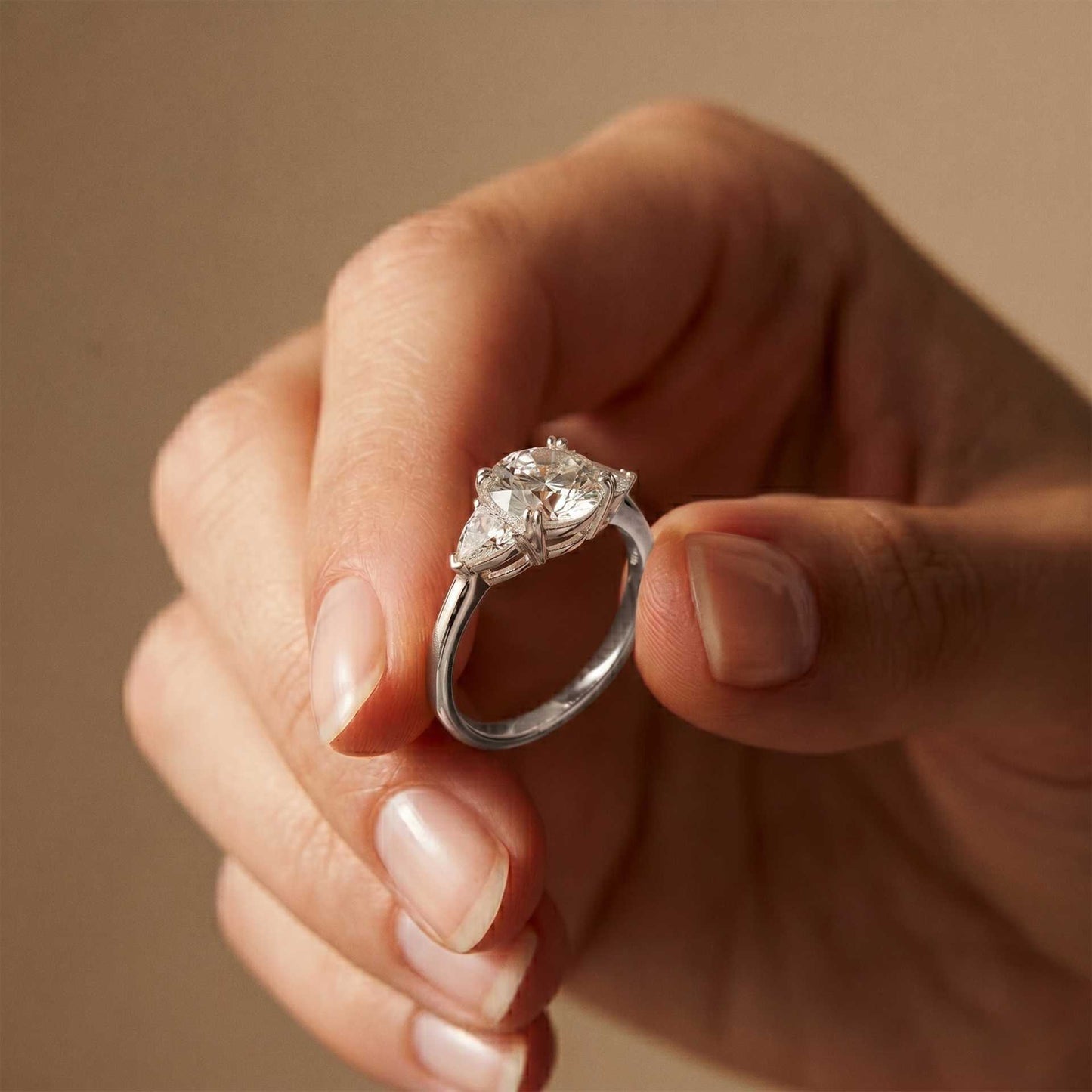 2.3 Ct Round & Trillion Moissanite Three Stone Elegance Ring