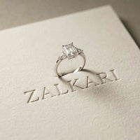 2.25 Ct Emerald & Pear Moissanite Trio Solitaire Ring