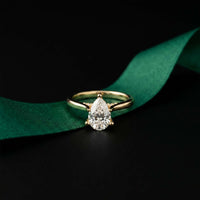 2.14 Ct Pear Moissanite Pavé Bridge Elegant Engagement Ring