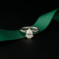 2.14 Ct Pear Moissanite Pavé Bridge Elegant Engagement Ring