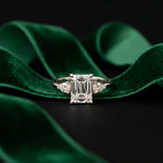 5.08 Ct Emerald Moissanite with Pear Side Stones Refined Accent Engagement Ring
