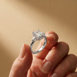 5.08 Ct Emerald Moissanite with Pear Side Stones Refined Accent Engagement Ring