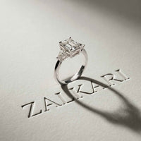5.08 Ct Emerald Moissanite with Pear Side Stones Refined Accent Engagement Ring