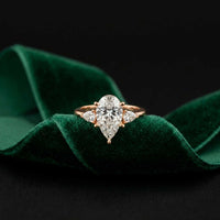 3.27 Ct Pear Moissanite with Pear Side Stones Graceful Fusion Engagement Ring