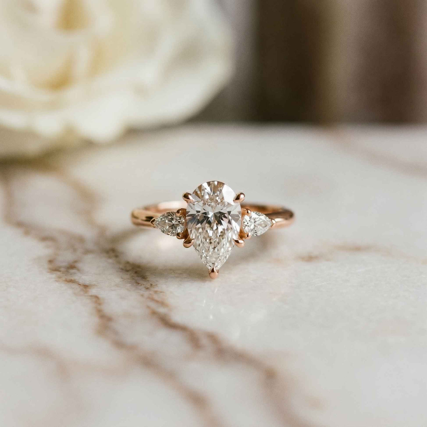 3.27 Ct Pear Moissanite with Pear Side Stones Graceful Fusion Engagement Ring