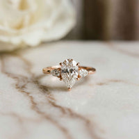 3.27 Ct Pear Moissanite with Pear Side Stones Graceful Fusion Engagement Ring