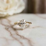3.27 Ct Pear Moissanite with Pear Side Stones Graceful Fusion Engagement Ring