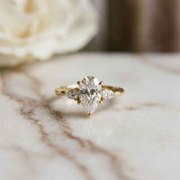 3.27 Ct Pear Moissanite with Pear Side Stones Graceful Fusion Engagement Ring