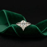 3.27 Ct Pear Moissanite with Pear Side Stones Graceful Fusion Engagement Ring