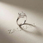 3.27 Ct Pear Moissanite with Pear Side Stones Graceful Fusion Engagement Ring