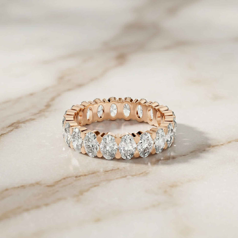 0.19 Ct Oval Cut Prong Set Slim Band Ring