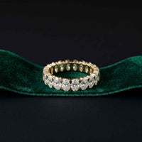 0.19 Ct Oval Cut Prong Set Slim Band Ring