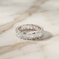 0.19 Ct Oval Cut Prong Set Slim Band Ring
