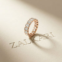 0.20 Ct Emerald Cut Bezel Set Sleek Band Ring