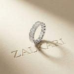 0.20 Ct Emerald Cut Bezel Set Sleek Band Ring