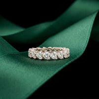 0.27 Ct Heart Cut Moissanite Shared Prong Eternity Band Ring