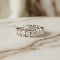 0.27 Ct Heart Cut Moissanite Shared Prong Eternity Band Ring