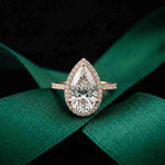 3.9 Ct Pear Cut Moissanite Halo Ring with Accent Stones