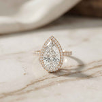 3.9 Ct Pear Cut Moissanite Halo Ring with Accent Stones