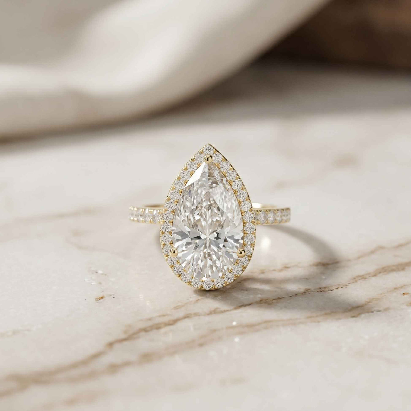3.9 Ct Pear Cut Moissanite Halo Ring with Accent Stones